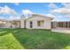 Well-maintained backyard features lush green grass, covered patio, and privacy fencing at 18629 N 10Th Ave, Phoenix, AZ 85027