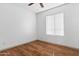 Bright bedroom features hardwood floors and natural light from window at 18629 N 10Th Ave, Phoenix, AZ 85027