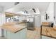 Bright kitchen featuring butcher block countertops, stainless appliances and ample lighting at 18629 N 10Th Ave, Phoenix, AZ 85027
