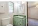 Bathroom with original-style green vanity at 1945 E Solano Dr, Phoenix, AZ 85016