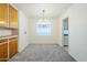 Well-lit dining room featuring a modern chandelier at 1945 E Solano Dr, Phoenix, AZ 85016