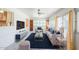 Comfortable living room with blue accent pillows, modern furniture, and natural light from large windows at 1945 E Solano Dr, Phoenix, AZ 85016