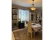 Cozy dining area with a decorative chandelier and a large decorative rug at 20230 N Jill Ave, Maricopa, AZ 85138