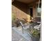 Cozy patio area with comfortable seating and decorative plants, perfect for relaxation and outdoor enjoyment at 20230 N Jill Ave, Maricopa, AZ 85138