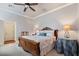 Cozy bedroom with decorative lamps and elegant furniture providing a serene retreat at 21109 W Sunrise Ln, Buckeye, AZ 85396
