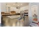 Spacious kitchen showcasing sleek countertops, stainless appliances and white cabinets at 21109 W Sunrise Ln, Buckeye, AZ 85396