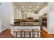 Modern kitchen with an island, stainless steel appliances, and ample cabinet space for functionality and style at 21109 W Sunrise Ln, Buckeye, AZ 85396