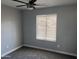 Bedroom with neutral carpet and large window at 2130 W Devonshire St, Mesa, AZ 85201