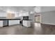 Bright kitchen features white cabinets, modern appliances, and an adjacent dining area at 2130 W Devonshire St, Mesa, AZ 85201