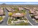 Exceptional aerial view showcasing the community pool, spa, and well-maintained landscaping at 2145 N 88Th St, Mesa, AZ 85207