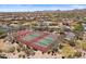 Aerial view of the community featuring tennis courts, pool, and desert landscaping at 2145 N 88Th St, Mesa, AZ 85207