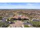 Exceptional aerial view showcasing the community clubhouse, resort-style pool, and well-maintained landscaping at 2145 N 88Th St, Mesa, AZ 85207