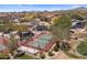 Community aerial featuring a tennis court, pool, and well-maintained desert landscaping at 2145 N 88Th St, Mesa, AZ 85207