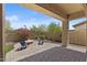 Cozy backyard patio with a fire pit and comfortable seating at 2145 N 88Th St, Mesa, AZ 85207