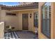 Inviting covered front entry with decorative wreath on the front door at 2145 N 88Th St, Mesa, AZ 85207