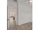 Hallway with sliding closet doors and an open view to a backyard patio at 2145 N 88Th St, Mesa, AZ 85207