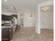 Spacious kitchen with granite countertops, stainless steel appliances, and an open floor plan at 2145 N 88Th St, Mesa, AZ 85207
