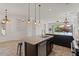 Open concept kitchen features modern appliances and island with seating at 2145 N 88Th St, Mesa, AZ 85207
