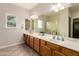 Bathroom boasting an oversized mirror, double vanity, and ample counter space at 22626 W Gibson Ln, Buckeye, AZ 85326