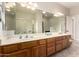 Bathroom boasts an oversized mirror, double vanity, and ample counter space at 22626 W Gibson Ln, Buckeye, AZ 85326