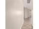 Bright hallway with tile flooring and arched doorway offers a welcoming transition to the rest of the home at 22626 W Gibson Ln, Buckeye, AZ 85326