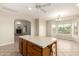 Bright kitchen island adjacent to the living area at 22626 W Gibson Ln, Buckeye, AZ 85326