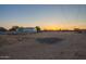 Large lot with utility lines and steel building at 22626 W Gibson Ln, Buckeye, AZ 85326