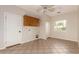 Spacious laundry room offering natural light, tile flooring, and ample storage space with lots of possibilities at 22626 W Gibson Ln, Buckeye, AZ 85326
