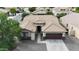 Stunning single-Gathering home featuring a tile roof, stone accents, two-car garage, and a well-manicured front yard at 2329 E Ebony Dr, Chandler, AZ 85286