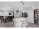 Bright kitchen with stainless appliances, center island, and nearby dining area at 23848 W Grove St, Buckeye, AZ 85326