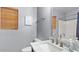 Bright bathroom featuring a marble vanity top, modern fixtures, and natural light at 2585 E Morgan Dr, Gilbert, AZ 85295