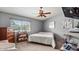 Bedroom with a view of mature landscaping through the window, and ample storage at 2585 E Morgan Dr, Gilbert, AZ 85295