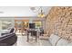 Open floor plan with backyard views, stone accent wall, and backyard view at 2585 E Morgan Dr, Gilbert, AZ 85295