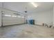 Spacious garage with an automatic overhead door at 25925 N 53Rd Dr, Phoenix, AZ 85083