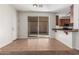 Dining area with tiled floor and sliding doors to covered patio at 28967 N 124Th Ave, Peoria, AZ 85383