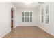 Bright dining room with plantation shutters, white walls and tile flooring at 28967 N 124Th Ave, Peoria, AZ 85383