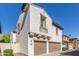 Charming two-story home showcasing a two-car garage, stucco siding, and a tile roof at 28967 N 124Th Ave, Peoria, AZ 85383