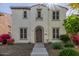 Charming two-story home with a well-maintained yard and beautiful front door at 28967 N 124Th Ave, Peoria, AZ 85383