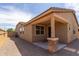 Charming single story home shows the covered patio, low maintenance landscaping, and great curb appeal at 296 N Jesse St, Chandler, AZ 85225