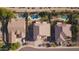 Overhead aerial view of neighborhood homes with backyard pools and well-kept yards at 2977 E County Down Dr, Chandler, AZ 85249