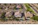 A high aerial shot features the beautiful neighborhood and backyard swimming pool at 2977 E County Down Dr, Chandler, AZ 85249