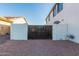 Fully enclosed backyard area surrounded by block walls, offering privacy and security at 2977 E County Down Dr, Chandler, AZ 85249