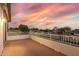 Expansive balcony offering panoramic views of the surrounding neighborhood and the desert sunset at 2977 E County Down Dr, Chandler, AZ 85249