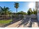Outdoor balcony overlooking lush greenery and lawn, perfect for relaxing and enjoying the serene environment at 2977 E County Down Dr, Chandler, AZ 85249