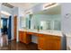 Large bathroom features dual sinks, generous counter space, and ample cabinet storage at 2977 E County Down Dr, Chandler, AZ 85249