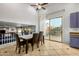 The dining area offers easy access to a balcony, kitchen, and living areas at 2977 E County Down Dr, Chandler, AZ 85249