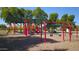 Fun playground with swings, slides, and climbing structures for outdoor enjoyment in the community park at 2977 E County Down Dr, Chandler, AZ 85249