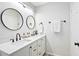 Modern bathroom with double sinks, stylish mirrors, and ample counter space perfect for daily routines at 3517 E Monterosa St, Phoenix, AZ 85018