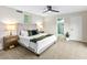 Well-lit bedroom features modern fixtures, a cozy bed, and a calming color palette for restful sleep at 3517 E Monterosa St, Phoenix, AZ 85018