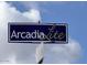 Arcadia Lite community sign against a bright sky with scattered clouds at 3517 E Monterosa St, Phoenix, AZ 85018